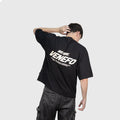 Remera negra oversize de algodón con estampa