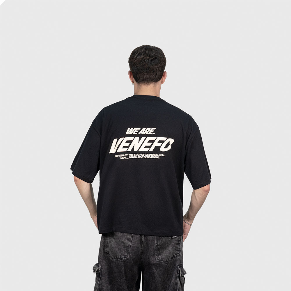 Remera negra oversize de algodón con estampa